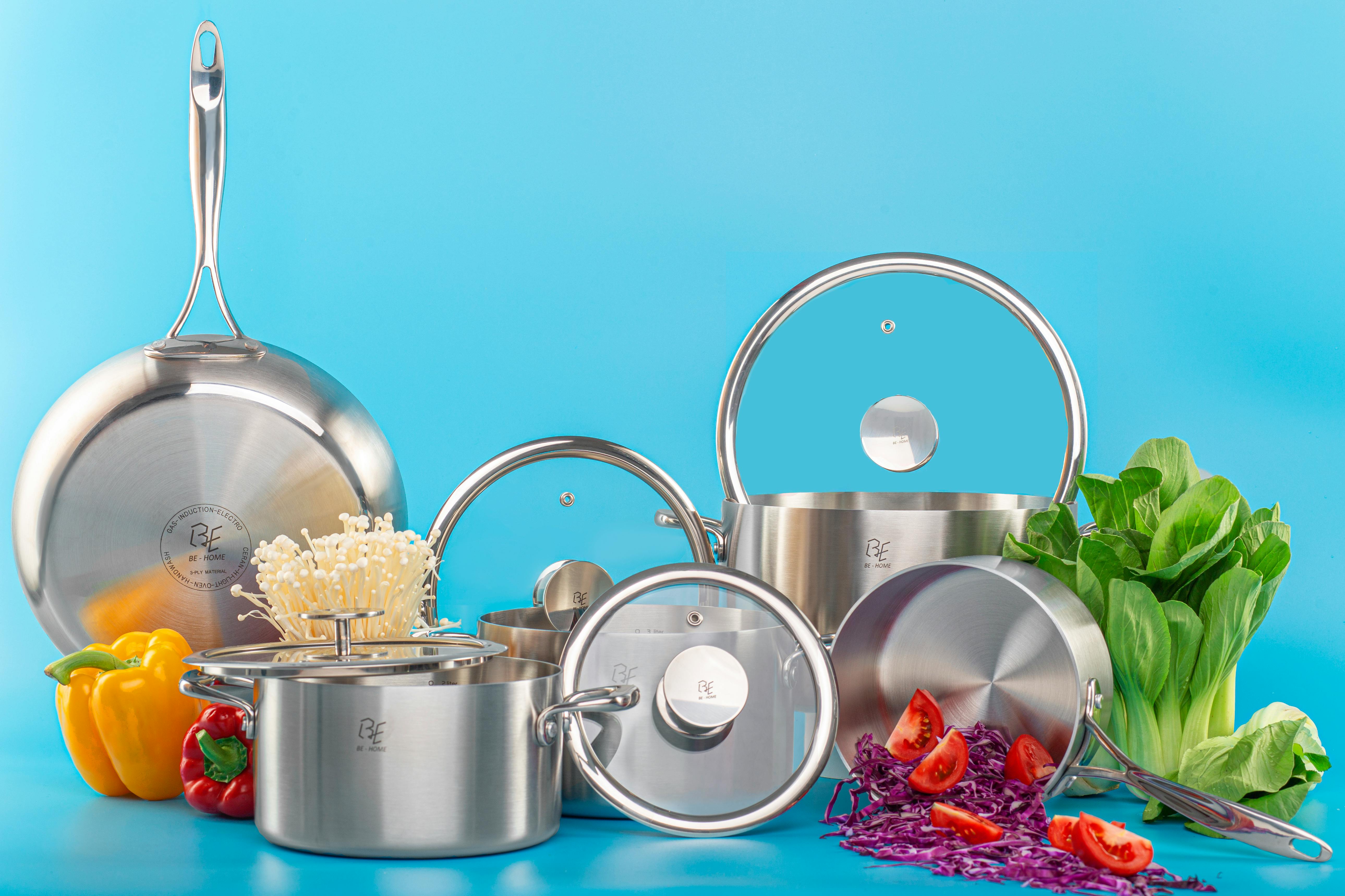 An image of stainless steel pots and pans.